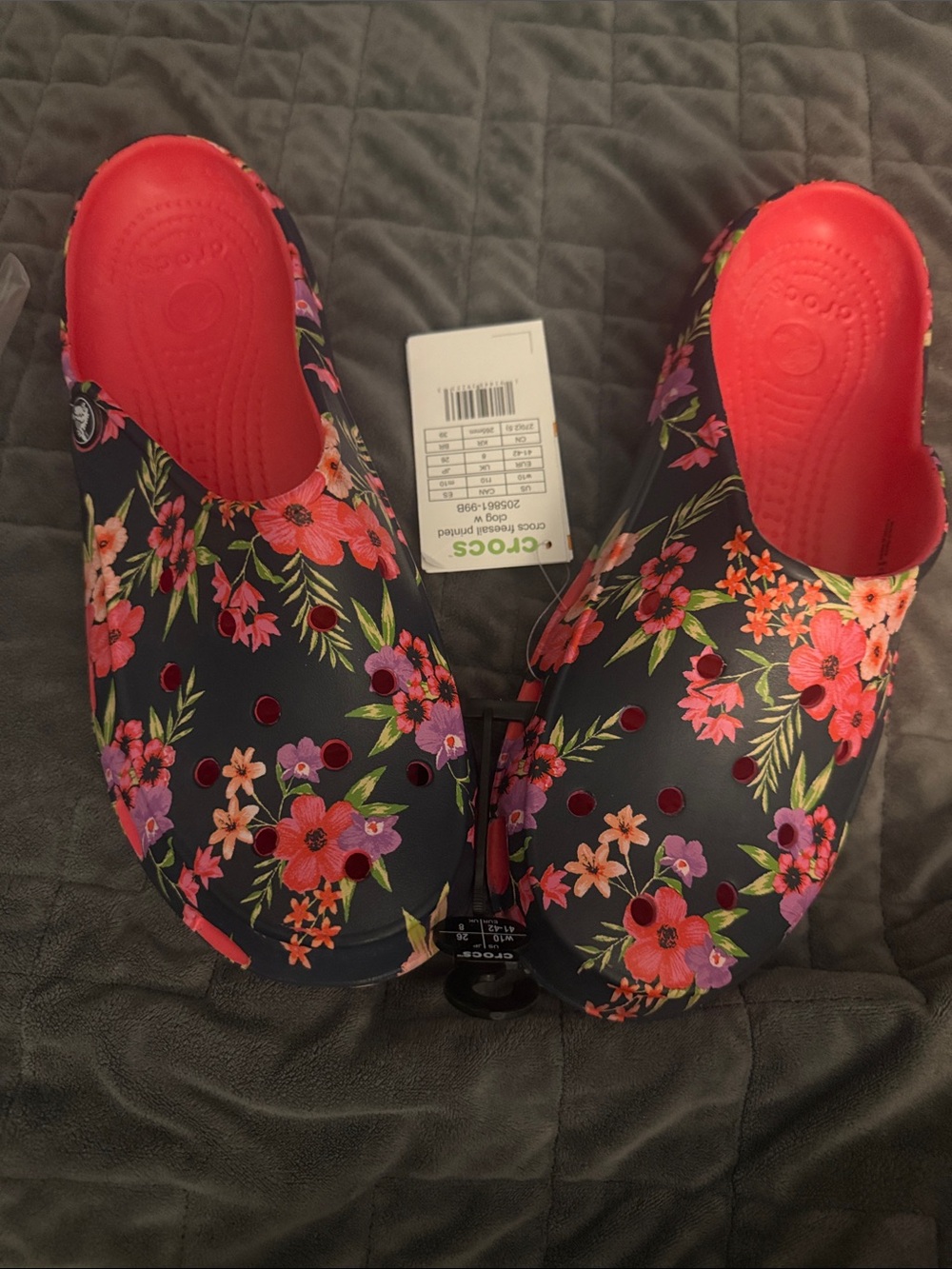 New Crocs Women's Floral Clog - Black with Pink Lining. Tropical floral/poppy
